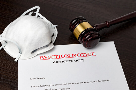 Eviction Notice Document With Gavel And N95 Face Mask. Concept Of Financial Hardship, Housing Crisis And Mortgage Payment Default During Covid-19 Coronavirus Pandemic.