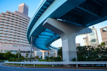 Japan. Infrastructure of the Japanese city. Transport system of Japan. Two-level roads on the background of buildings. Railway bridge in a Japanese city. Travel to Japan.