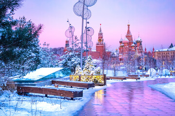 Moscow. Christmas in Russia. Decorations of Moscow streets on the background of the Kremlin. Spasskaya tower of the Kremlin. St. Basil's Cathedral. Winter in Russia. New year's trip to Russia.