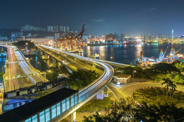 cargo port and highway in Hong Kong city at night