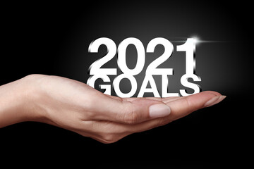 New Year goals 2021 with hand.