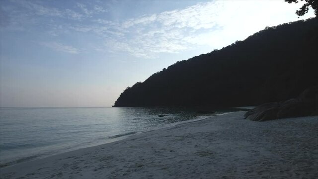 Peaceful sunrise at a  beach in the Perhentian Islands in Malaysia.Nobody.