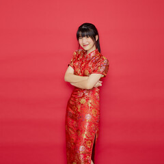 Asian woman wear Chinese dress with action