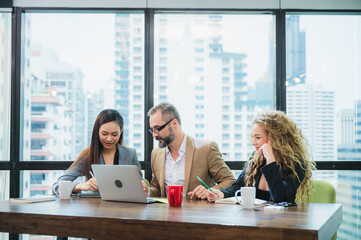 The corporate of worker officer discussion and sharing the project idea with leader manager