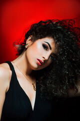Fototapeta premium portrait of a woman with curly hair