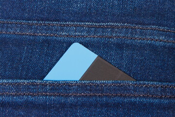 Credit card for cashless paying in pocket of jeans. Finance and banking