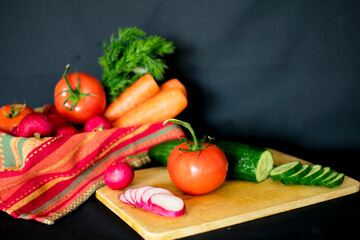Fresh vegetables lie on the table