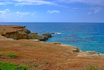 rocky coast against the blue sea