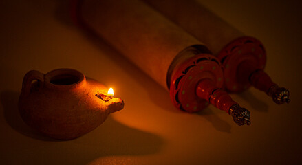 Ancient Lamp Illuminating the Hebrew Text of the Torah