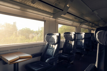 Train interior with empty seats traveling in Germany. Intercity express train with no people