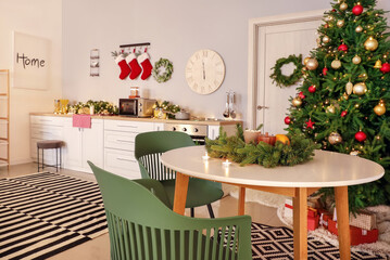 Interior of modern kitchen decorated for Christmas