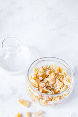 Homemade dried candied zucchini on a light background. Candied vegetables. Vegetarian sweets. Сopy space