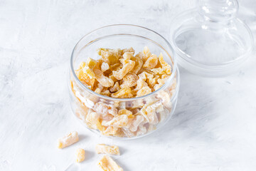 Homemade dried candied zucchini on a light background. Candied vegetables. Vegetarian sweets.