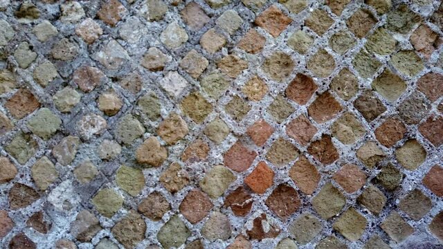 Detail of Opus reticulatum a.k.a. reticulated work, a form of brickwork used in ancient Roman architecture.  Location in Ostia Antica, a world famous archaeological site.