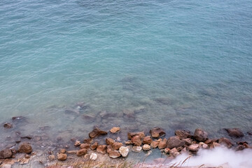 Sulfuric gasses at a blue lake