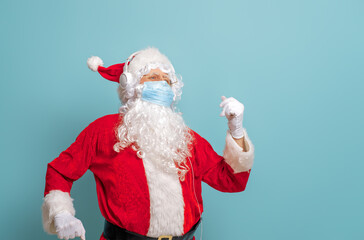 Fototapeta na wymiar Santa Claus in face mask during Covid-2019