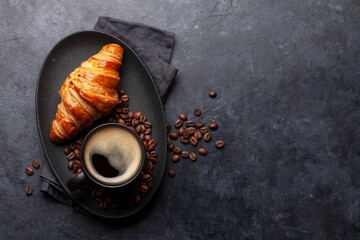 Espresso coffee and croissant for breakfast