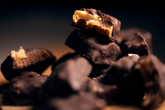 Small Pieces Of Peanut And Caramel Cluster Fudge, Dessert Background.