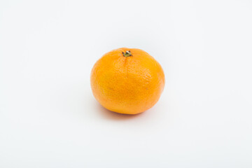 Orange tangerine on white background