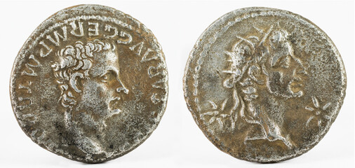 Closeup of an ancient Roman silver denarius coin of Emperor Caligula with Augustus deified.
