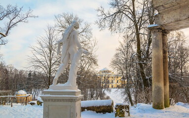 Ruin of Apollo in the snow-covered winter Pavlovsky park