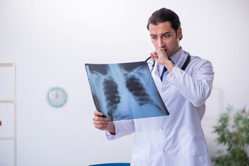 Young male doctor radiologist working in the clinic