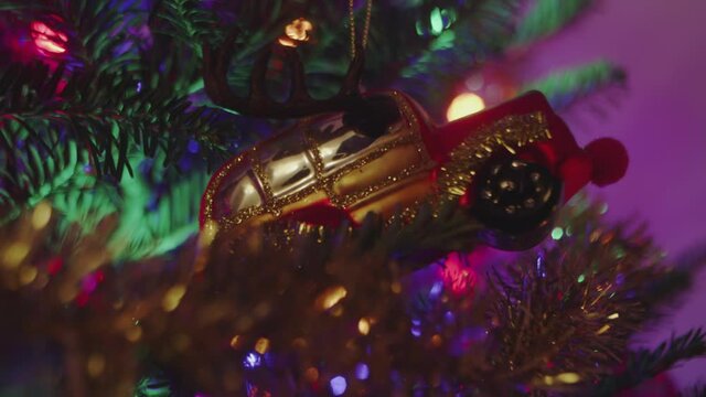 Decorative ornament hanging on a christmas tree indoors
