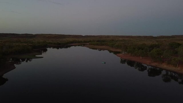 Dawn Footage of a Still Lake in the Australian Outback.
Location: Lake MaryAnne, Tennant Creek, Northern Territory.