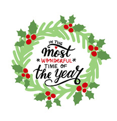 In the most wonderful time of the year. Christmas wreathe and hand lettering holiday greeting quote. Modern calligraphy. Congrats cards design element. Xmas phrase