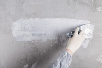 white strip of putty on the wall, a place for your inscription