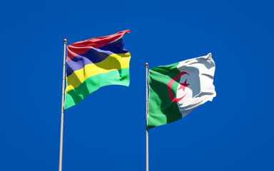 Beautiful national state flags of Mauritius and Algeria together at the sky background. 3D artwork concept.