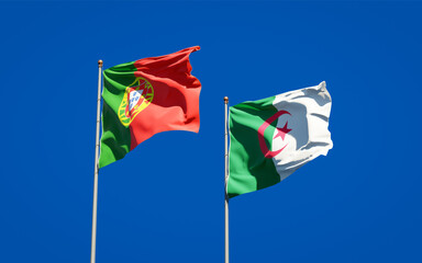 Beautiful national state flags of Portugal and Algeria together at the sky background. 3D artwork concept.