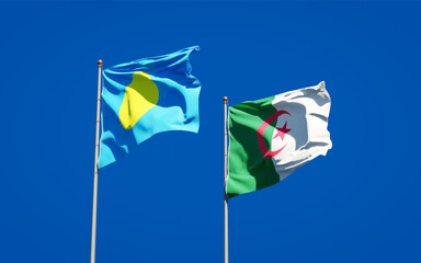 Beautiful national state flags of Palau and Algeria together at the sky background. 3D artwork concept.