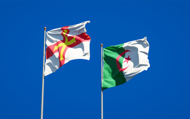 Beautiful national state flags of Guernsey and Algeria together at the sky background. 3D artwork concept.