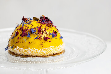 Passion fruit & mango patisserie on white background