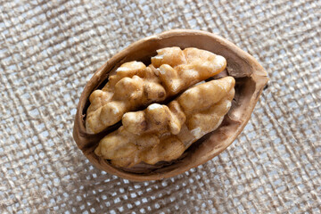 Fresh walnuts on burlap. Healthy food.