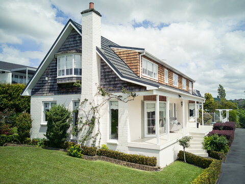 AUCKLAND, NEW ZEALAND - Oct 18, 2019: suburban house with chimney in Howick