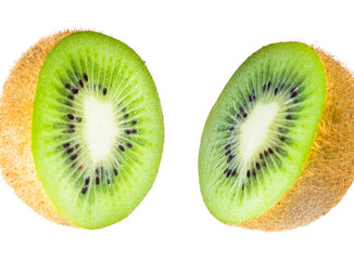 Isolated kiwi. One kiwi fruit cut in halves isolated on white background