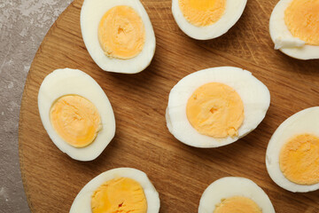 Board with hard boiled eggs, close up