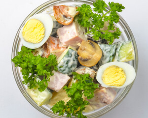 Healthy food - mix vegetable salad served in a bowl over white background. Healthy eating, delicious snack or dinner.