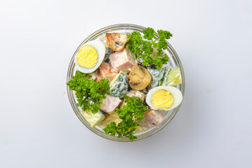 Healthy food - mix vegetable salad served in a bowl over white background. Healthy eating, delicious snack or dinner.
