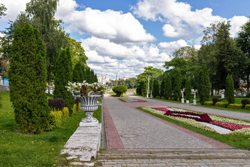 Fototapeta na wymiar Tver, Tver region. Bright summer day in the city garden. Picturesque clouds