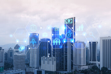 Research and development hologram over panorama city view of Kuala Lumpur. KL is hub of new...
