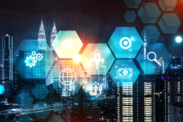 Research and technological development glowing icons. Night panoramic city view of Kuala Lumpur. Concept of innovative activities expanding new services or products in Malaysia, Asia. Double exposure.