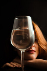 Color portrait of  girl with  glass of water