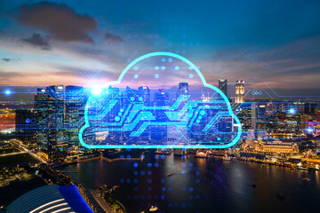 Glowing hologram of cloud icon, aerial panoramic cityscape of Singapore at sunset. The concept of secure storage of digital data in Asia. Multi exposure.