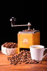 Fresh cafe for morning breakfast refresh caffeine white cup roasted organic coffee bean farm in vintage wood grinder classic metal coffee pot for black espresso and cream milk cappuccino latte