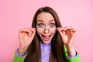 Close-up portrait of nice amazed cheerful crazy overjoyed girl geek touching specs cool news...