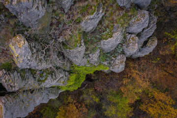 Kisapati, Hungary - Aerial view of volcanic basalt organs at Szent Gyorgy-hegy near lake Balaton with moody tones and warm autumn colored trees.