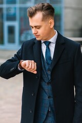 Fashion shot of a handsome young man in elegant classic suit. Men's beauty, fashion.